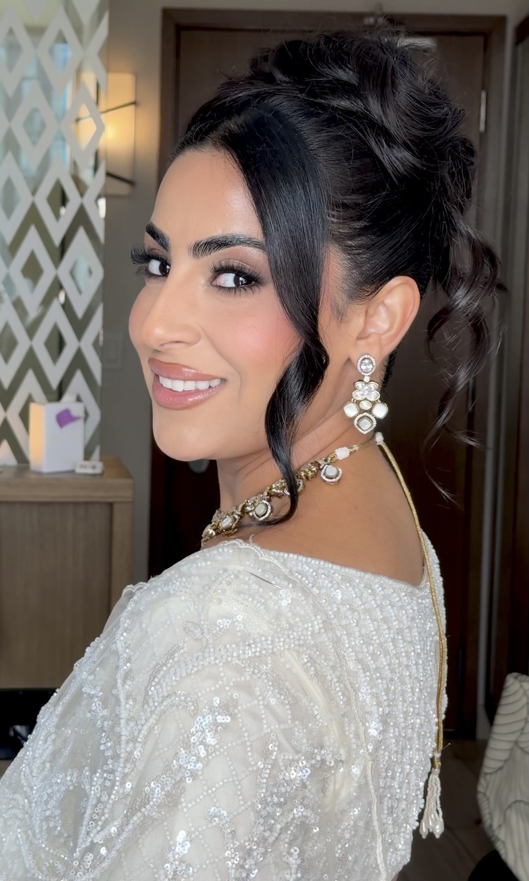 Bridal look — white embellished outfit, updo